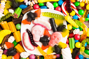 Overhead view of table with candies for halloween
