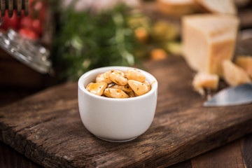 Spicy garlic cloves in bowl,spanish tapa bar food