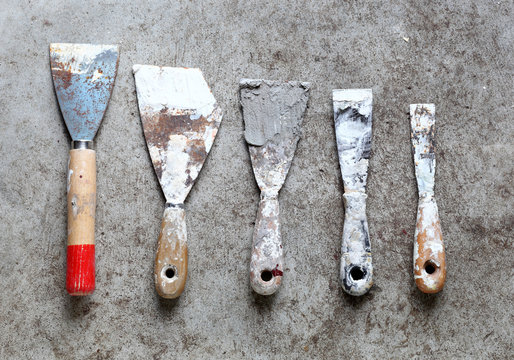 Old and dirty putty knives
