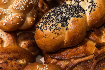 Different bakery products on a wooden background