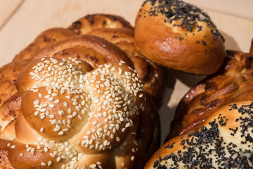 Different bakery products on a wooden background