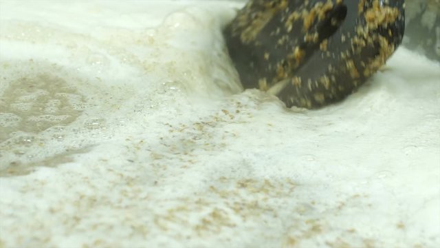 cooking barley grains for producing beer at the brewery. raw beers are brewed