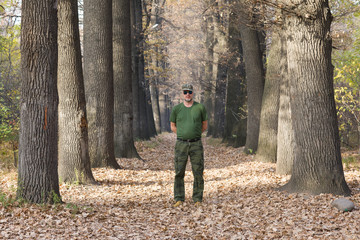 Fototapeta na wymiar military man in the woods