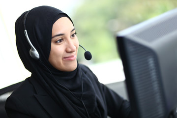 Beautiful muslim lady at work