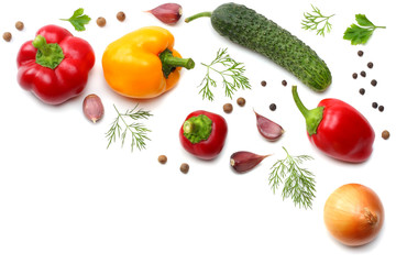 mix of sliced cucumber, garlic, sweet bell pepper and parsley isolated on white background. top view