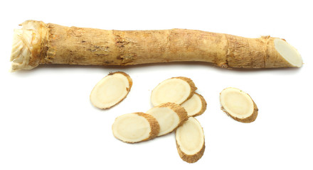 sliced horseradish root isolated on white background