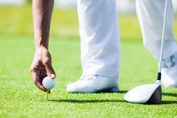 Professional Golf Player teach how to Teed Up Golf Ball