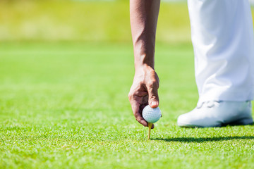 Professional Golf Player teach how to Teed Up Golf Ball