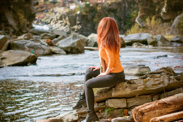Travel in mountains. River with stones on shore. Heat temptation. Satisfaction of wish. Lady in peace and harmony and rest in pleasure, Mountain lake, beautiful girl relaxing vacation concept