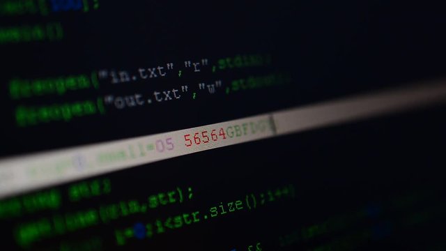 Source code on the monitor screen.