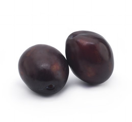 Plums on white background