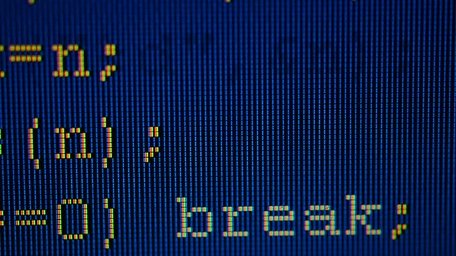 Source code on the monitor screen.