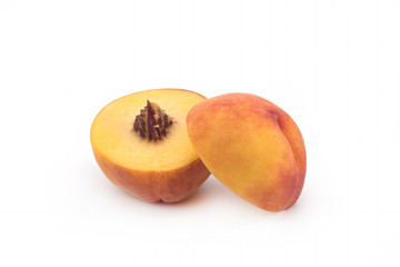 ripe yellow peaches on white background