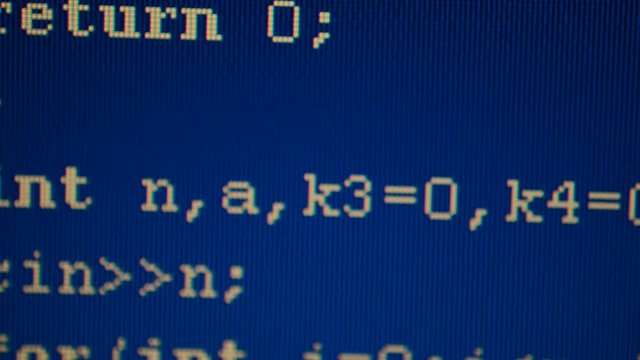 Source code on the monitor screen.