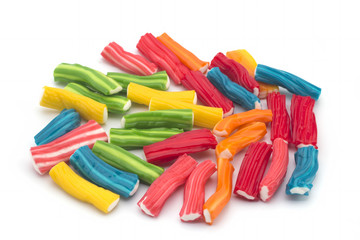 Colorful lollipops and different colored round candy