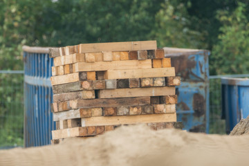 Stacked wood on a construction site