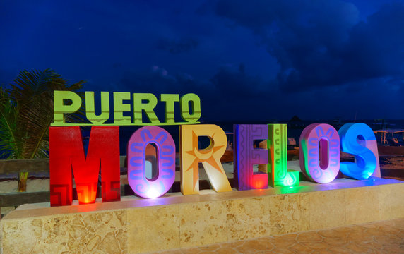 Puerto Morelos sunset word sign Mexico