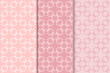 Set of floral ornaments. Pale pink vertical seamless patterns