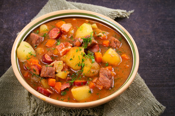 Tasty stew. Goulash soup bograch in a bowl. Hungarian dish, horizontal