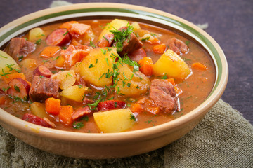 Tasty stew. Goulash soup bograch in a bowl. Hungarian dish, horizontal