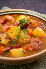 Tasty stew. Goulash soup bograch in a bowl. Hungarian dish, vertical