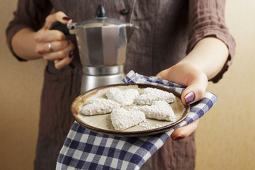 Strong espresso coffee using a coffee geyser and biscuits in the shape of a heart, St.Valentine's Day concept