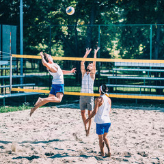 Beach volleyball detail - Males on the net