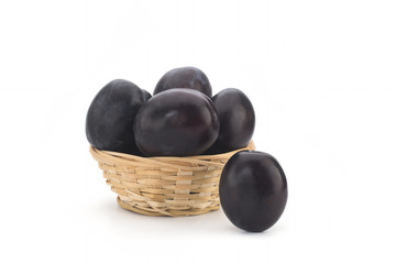 Plums on white background