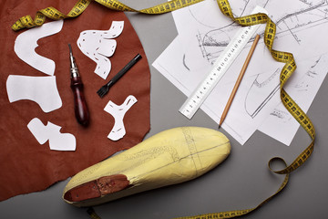 Workplace of shoe designer Selective focus.Copy space.Top view