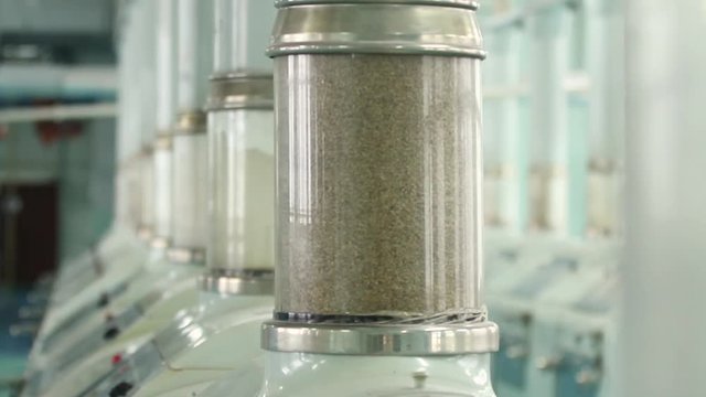 Flour mill. Manufacture of flour and cereals. Wheat milling. Production of wheat flour. Wheat flour milling equipment at the plant. Grain equipment.