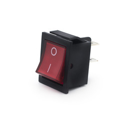 Red power switch, powered on position, isolated macro closeup