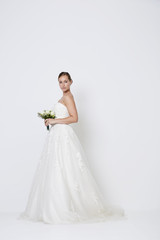 Fototapeta na wymiar Stunning bride to be in wedding dress, portrait