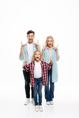 Full length portrait of a happy cheerful young family