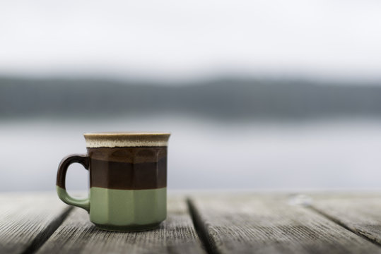 Morning Coffee Mug On the Cottage Dock In Summer