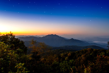 Beautiful landscape sunrise with star on sky at doi inthanon national park. 
