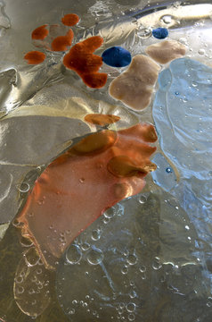 closeup macro of the intricate patterns and texture of fluids intermixing