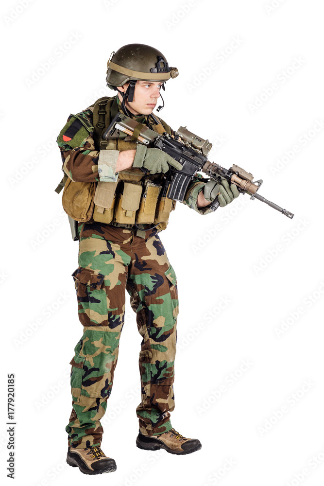 Wall mural portrait soldier or private military contractor holding sniper rifle.