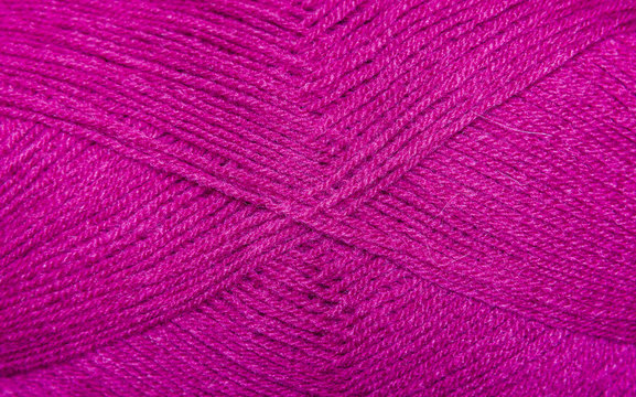 background thread for knitting. Knitting pattern of colorful yarn wool.