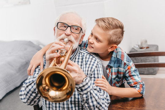 Grandfather playing trumpet