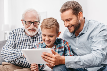 Family using digital tablet