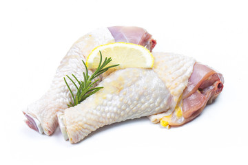 Raw chicken legs on white background isolated