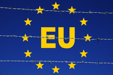 EU Flagge hinter Stachdraht