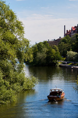 A small wooden motor boat in Stockholm