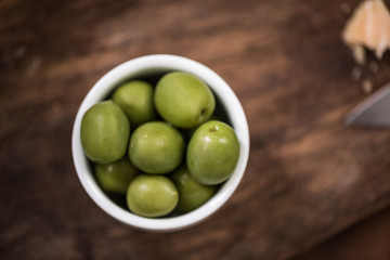 Green olives in bowl,spanish tapa bar food
