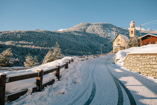 Snow-covered road on the Alps