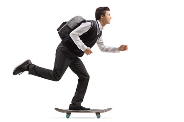 Teenage student riding a skateboard © Ljupco Smokovski