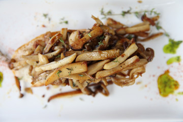 Crispy toasted white bread with mushrooms on wood background table
