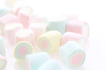 Pastel colourful marshmallows isolated in white background