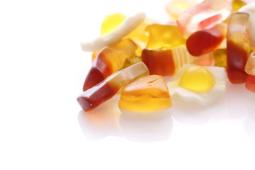 gummy candy with cola heart egg ring bear isolated in white background
