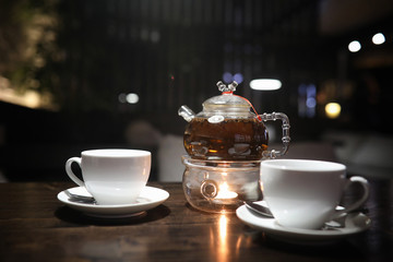 A table in a cafe with objects